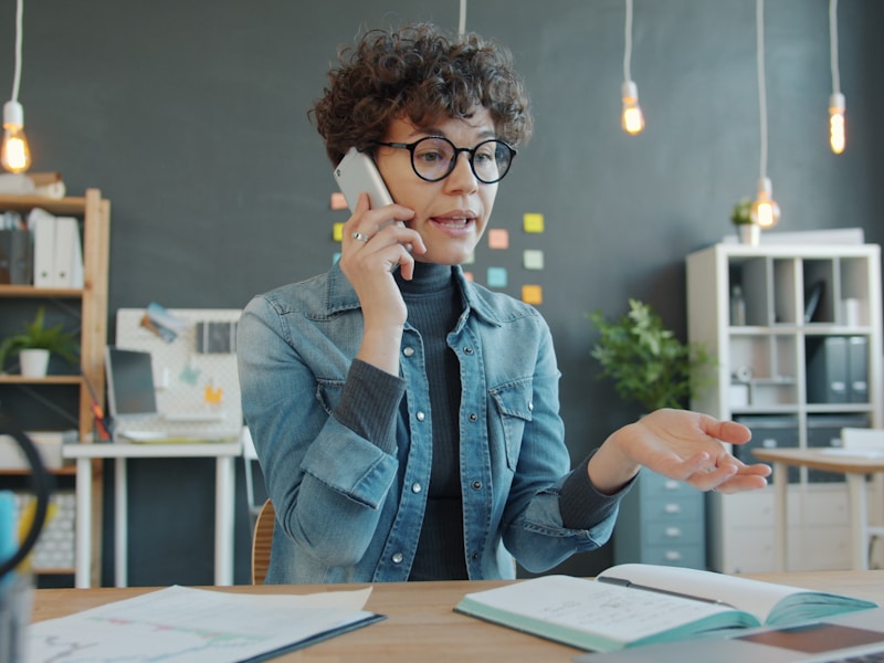 Receptionist scheduling appointments by phone